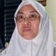 Husniah Talenrang, yang diberhentikan dari jabatannya berdasarkan SK Menteri Dalam Negeri.
